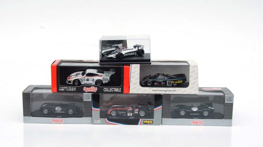 A collection of Quartzo 1:24 scale 24-Hour Le Mans winning diecast models including Jaguar D Type,