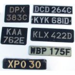 A collection of seven vintage number plates for display purposes only (7).