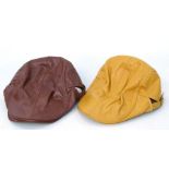 Two leather caps in yellow and brown (new old stock) (2).