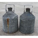 Two 1930's Regent Oil Company Ltd five-gallon galvanised petrol cans with carrying handles and screw