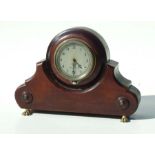 A Smith's rim wind dashboard clock, the silvered dial with Arabic numerals, 8.5cms diameter, mounted