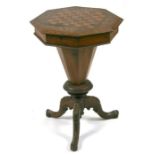 A Victorian walnut trumpet sewing box, the octagonal top with Tunbridgeware inlaid decoration and