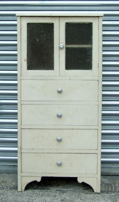 A painted pine kitchen cabinet with a pair glazed panelled doors above four drawers, on a shaped - Image 2 of 2