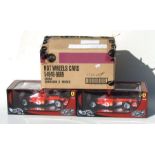 Two Hot Wheels 1:18 scale new old stock Michael Schumacher five times champion diecast F1 models,