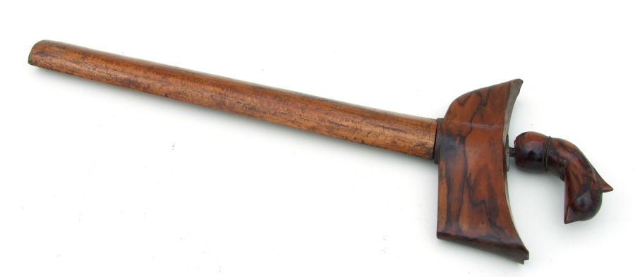 An Indonesian Kris in its wooden scabbard. Blade length 31cms (12.25ins) - Image 2 of 3