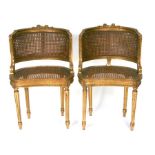 A pair of French giltwood salon chairs with double bergere backs(2).Condition Reportjoints firm,