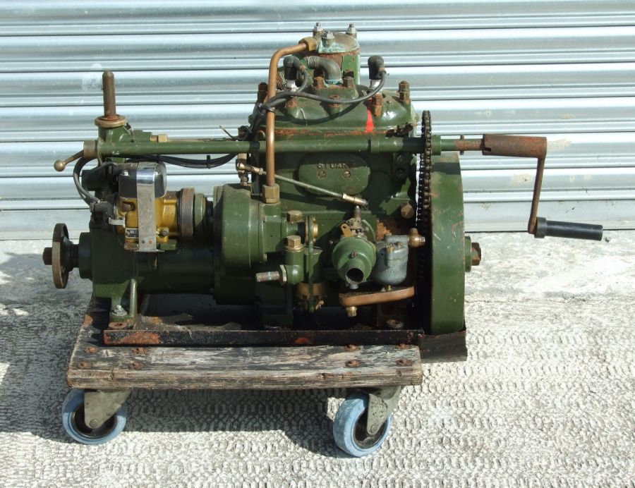 A Stuart Turner Ltd twin cylinder marine engine, rated at 8hp at 1500rpm, serial no. P55.ME608755,