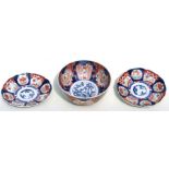 A Japanese Imari bowl, 22cms diameter; together with two Japanese Imari plates, 22cms diameter (3).