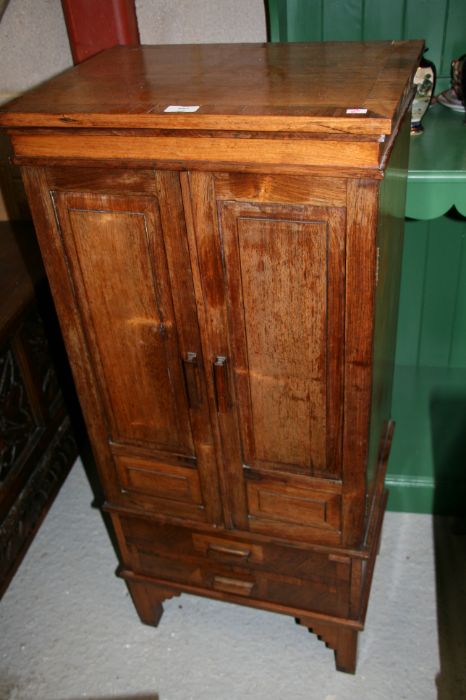 An early 20th century Cotswold school Gimson style side walnut cabinet, the pair of panelled doors - Image 6 of 9