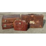 A group of vintage leather luggage to include one with Cunard Shipping labels with return address to