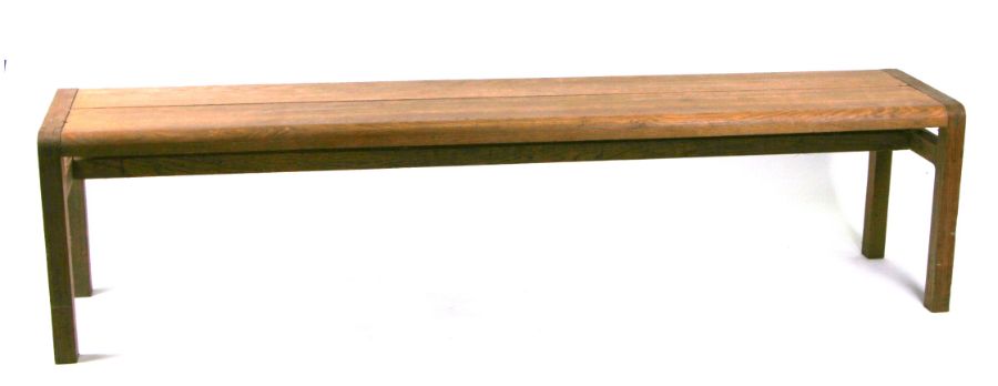 A large Arts & Crafts style oak bench, 180cms long.