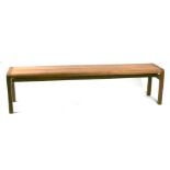 A large Arts & Crafts style oak bench, 180cms long.