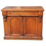 A Victorian mahogany chiffonier with single frieze drawer above a pair of panelled doors, on a