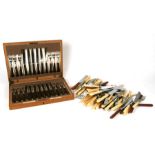 An oak cased canteen of Goldsmiths & Silversmiths silver plated cutlery; together with a quantity of