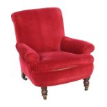 A Victorian red upholstered armchair on turned front supports.Condition Reportgood overall condition