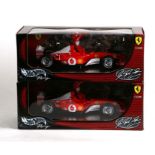 Two Hot Wheels 1:18 scale new old stock Michael Schumacher five times world champion limited edition