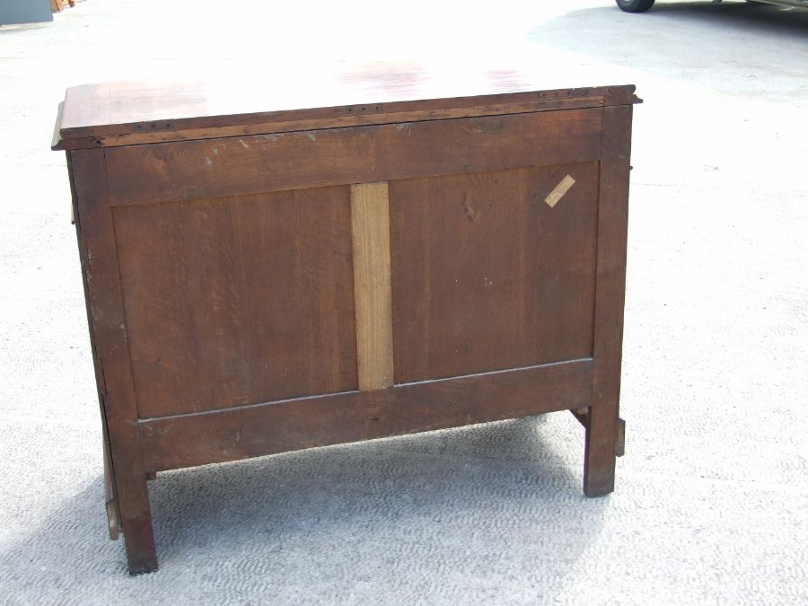 A continental walnut chest of two short and three long drawers standing on turned feet. 113cm wide - Image 2 of 3