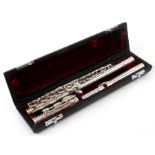 A John Packer Ltd three-piece silver plated flute, cased.