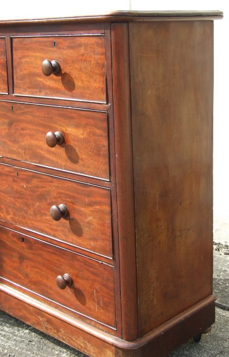 A Victorian mahogany chest of two short and three long drawers, on a plinth base, 120cms wide. - Image 3 of 3