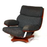 A Vintage mid century G-Plan Housemaster chrome and teak swivel armchair, model no. 406, re-