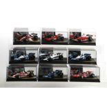 A collection of Quartzo 1:43 scale F1 Grand Prix winning cars including Lotus 78, Ferrari 312T3,