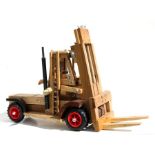 Part of the Gordon Woodham collection, a scratch bulit wooden Hyster fork lilt truck. Overall length