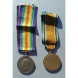 A WWI Devon Regiment casualty Medal pair named to 7947 PTE. M.TIDWELL. DEVON REG.