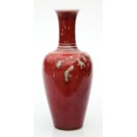 A Chinese Sang de Boeuf style vase with six character blue mark to the underside, 24cms high.