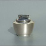 A Colibri silver table lighter of cylindrical form, weight 143g, Birmingham 1968, 7cms diameter.