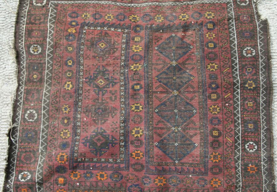 A Caucasian Shirvan rug with repeated geometric pattern on a brown ground, 102 by 170cms. - Image 9 of 10