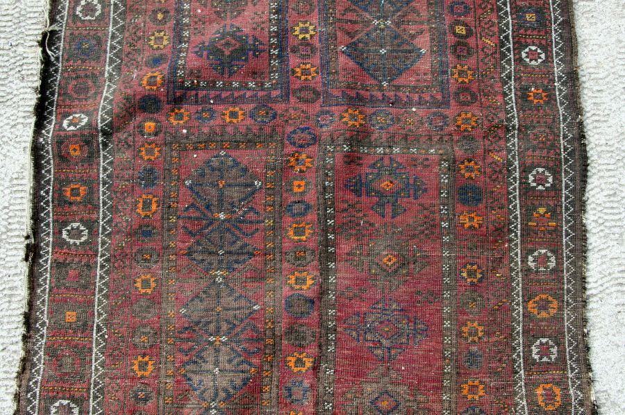 A Caucasian Shirvan rug with repeated geometric pattern on a brown ground, 102 by 170cms. - Image 8 of 10