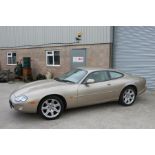 A 1997 Jaguar XK8 Coupe, registration no. M6 PWB, chassis no. SAJJGAED3AR021865, engine no.