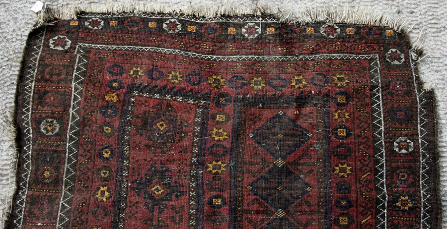 A Caucasian Shirvan rug with repeated geometric pattern on a brown ground, 102 by 170cms. - Image 10 of 10