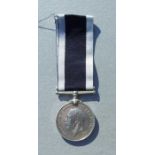 A Royal Navy Long Service Good Conduct Medal named to J.86910 R.K.MEDCRAFT R.N. HMS. NELSON.