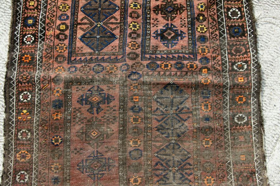 A Caucasian Shirvan rug with repeated geometric pattern on a brown ground, 102 by 170cms. - Image 4 of 10