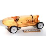 Part of the Gordon Woodham collection, a scratch built wooden 1909 Blitzen-Benz motor racing car.