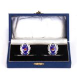 A pair of silver and enamel Masonic napkin rings, St Olave's Lodge, no. 2764, 1932, cased.