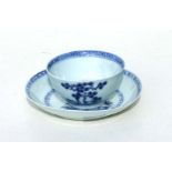 A Nanking Cargo blue & white porcelain teabowl and saucer, Christies lot labels to both, the