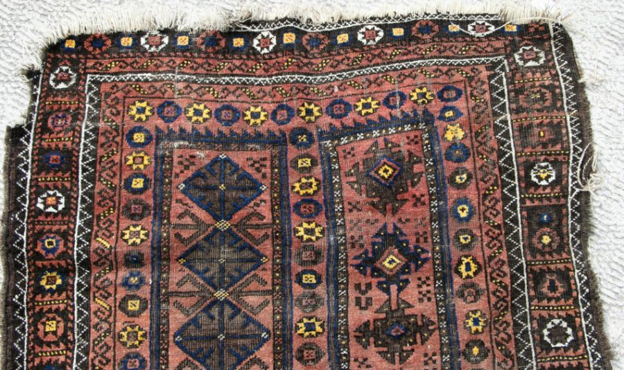 A Caucasian Shirvan rug with repeated geometric pattern on a brown ground, 102 by 170cms. - Image 6 of 10