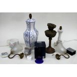 A blue & white pottery table lamp of baluster form, 42cms high; together with other table lamps, a