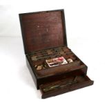 A Georgian mahogany artist box with drawer contents including paint blocks. 28cm wide