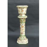 An Italian Capodimonte jardiniere on stand, overall 94cms high.