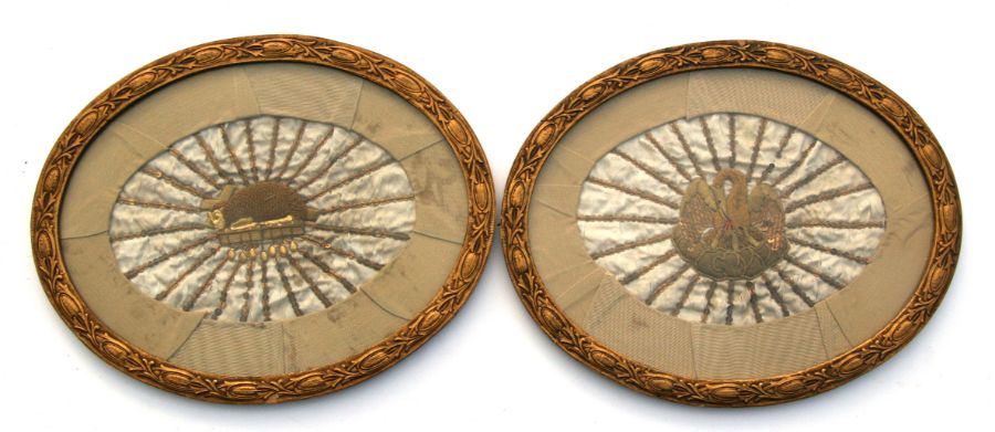 A pair of late 18th / early 19th century oval bullion wire yellow coloured metal and embroidered