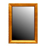 A modern Finlay wall mirror with bevelled edge plate, 101cms wide.