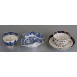 An 18th century Worcester tea bowl and saucer; together with a blue & white tea bowl; and a pickle