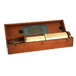 A Stanley Great Turnstile cylindrical slide rule calculator, walnut grip and fittings, brass