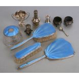 A guilloche enamel silver part dressing table set; together wtih a sterling silver trophy, a pair of