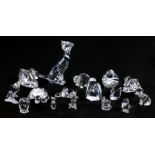 A large quantity of Swarovski crystal animals to include a lioness, a reindeer, owls, a cat,