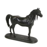 A bronzed spelter figure in the form of a standing horse, 37cms high.