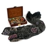 A quantity of costume jewellery in a brown jewellery box; together with a vintage beaded flapper